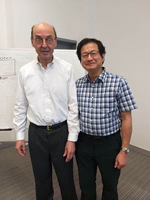 Professor Albert van den Berg with William Leung