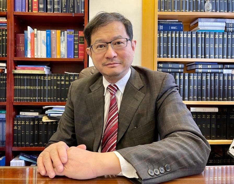 Dr. Leung in his office